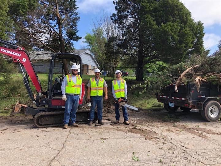 Summit Team Members Assisting the Community