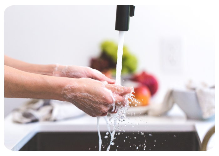 washing hands with warm water